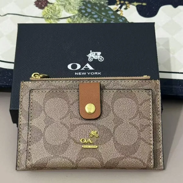 Tarjetero Coach (llega con logo bien)